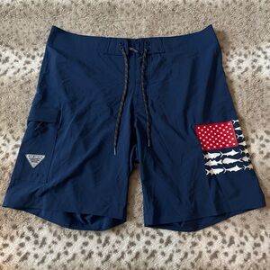 Columbia Navy Swim Shorts with Fish and Flag Design
